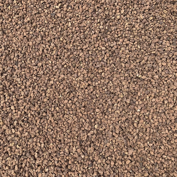 pea gravel can be a low-maintenance alternative to traditional mulch in garden beds, providing a unique texture and appearance